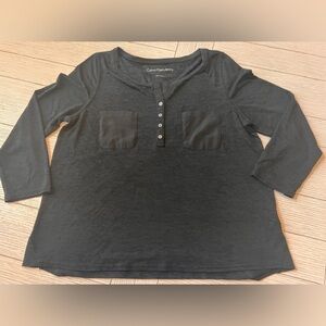 Calvin Klein basic black T with‎ front pockets, button front. Size L